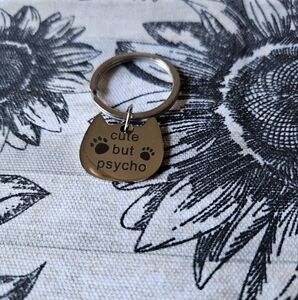 Cute but psycho cat shaped collar tag